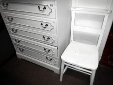 A 5 drawer chest of drawers & a white painted chair