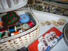 A sewing basket & knitting needles etc.