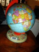 A vintage Chad Valley tin plate globe