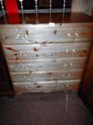 A 5 drawer chest of drawers