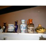 A selection of porcelain vases etc.
