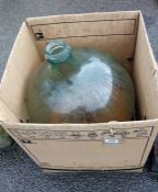 A large glass carboy