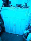 A white painted 2 door cupboard