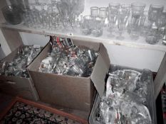 A large quantity of drinking glasses