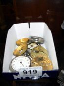 A quantity of pocket watch parts