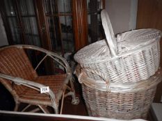 A quantity of wicker baskets & child's chair etc.