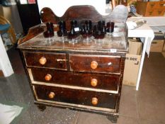 An antique pine chest of drawers