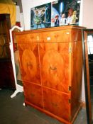 A superb inlaid cabinet