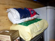 A quantity of pillows and duvet