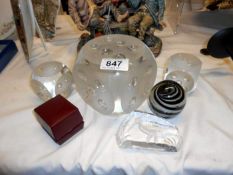 A quantity of paperweights