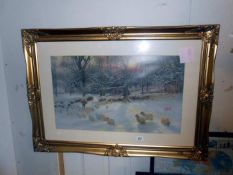 A large gilt framed pictured