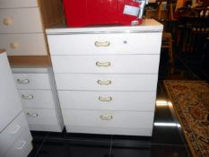 A 5 drawer chest of drawers