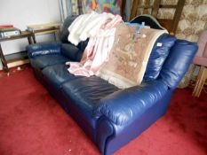 A blue 3 seater settee