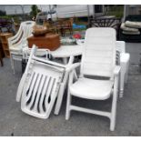 A large quantity of white garden chairs, a garden table etc