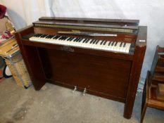 An Evestaff mini piano