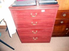 A modern chest of 4 drawers