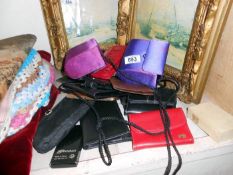 A quantity of purses etc