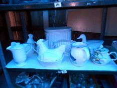 A quantity of china, egg baskets, jugs etc, 1 shelf