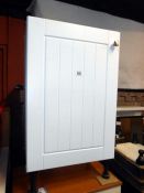 A white single door cupboard