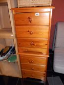 A pair of pine 3 drawers