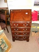 A mahogany bureau with 4 drawers