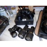 3 pairs of binoculars