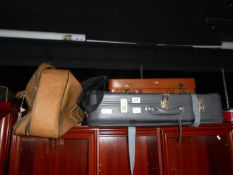 A quantity of suitcases etc