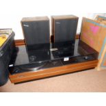 A stereo deck and speakers