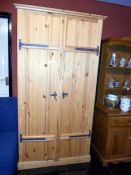 A pine 2 door wardrobe