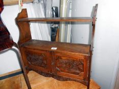 An old 2 door shelf wall unit