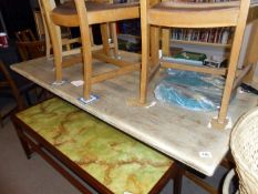 A large stripped oak dining table