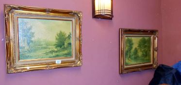 A pair of gilt frame pcitures