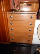 A 5 drawer chest of drawers