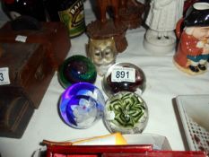 A quantity of paperweights