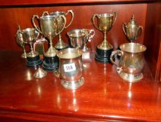 A quantity of trophies etc