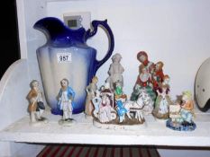 A quantity of figures including jug