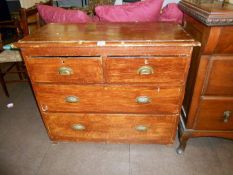 An antique pine chest of drawers