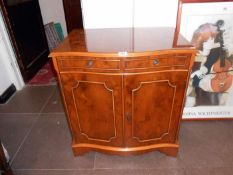 A Harris & Baker yew wood cabinet