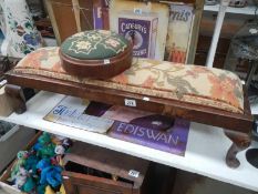 An Edwardian long foot stool on Queen Anne legs & a round footstool with tapestry top