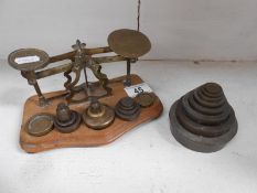 A set of Victorian post office scales & collection of brass weights