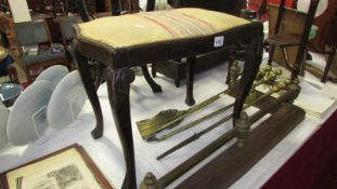 An Edwardian dressing table stool with carved Queen Anne legs