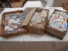 3 boxes of various stamps