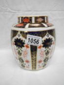 A Royal Crown Derby ginger jar and cover (18cm high)