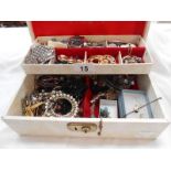A white jewellery box of costume jewellery