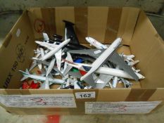 A box of airplane models including metal