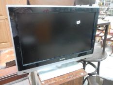 A Philips 32" flat screen TV