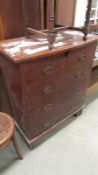 An arts & crafts pine chest of drawers with art nouveau steel handles