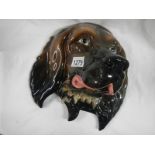 A Beswick Irish Setter wall plaque,