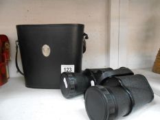 A cased pair of Omiya 10x50 binoculars