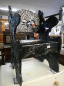 Carved black painted chair